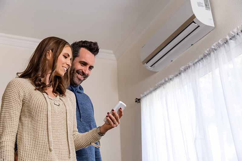 Couple looking at Ductless Mini-Split
